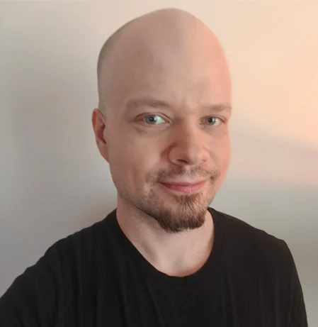 Jussi Alanen smiling at the camera